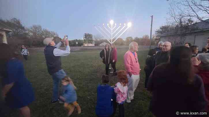Community celebrates first menorah lighting in downtown Buda for Hanukkah