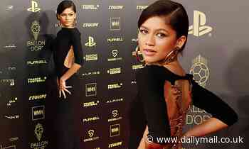 Zendaya oozes style in a dress encompassing gold snake straps for the Ballon d'Or