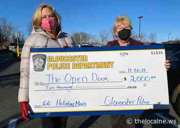 Gloucester Police Department donates to The Open Door Food Pantry this holiday season - The Local Ne.ws