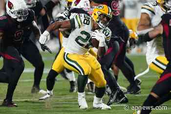 1st-place Packers visit Vikings, with Dillon at RB for Jones - Associated Press