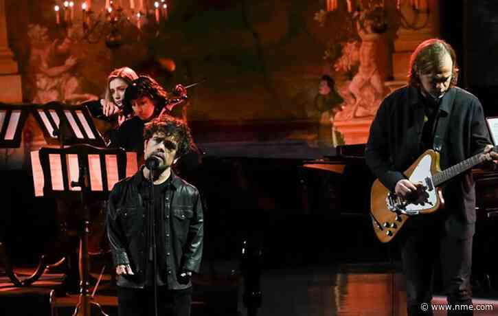 Watch Peter Dinklage join Aaron and Bryce Dessner to perform ‘Your Name’ on Colbert