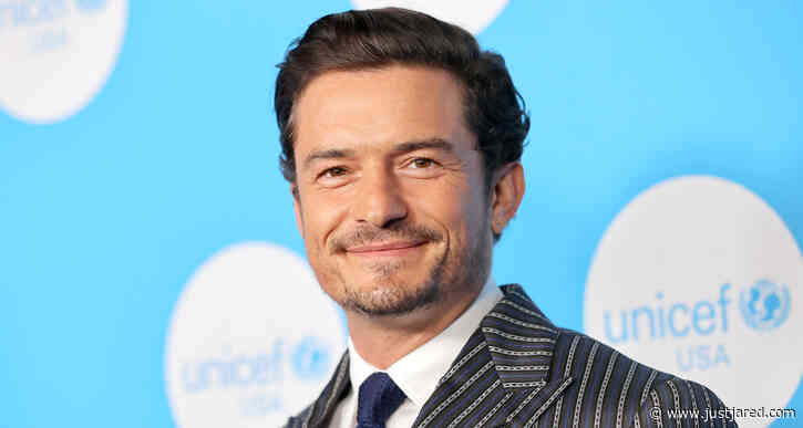 Orlando Bloom Sports Pin-Striped Suit for UNICEF At 75 Celebration