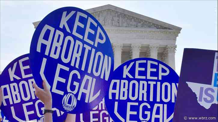 Justices signal they'll OK new abortion limits, may toss Roe