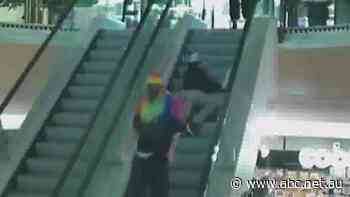 Book store hires security after COVID-19 marshal 'pushed over' at top of escalator