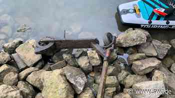 Mannheim: Surfrider holt E-Scooter aus dem Neckar - SWR