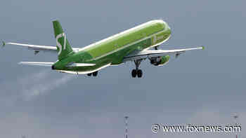 COVID-19 omicron variant unravels travel industry's plans