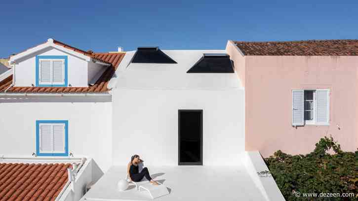 Box Arquitectos tucks Windmill House into skinny site in Portugal