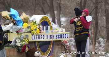 Charges weighed for Michigan shooting suspect's parents