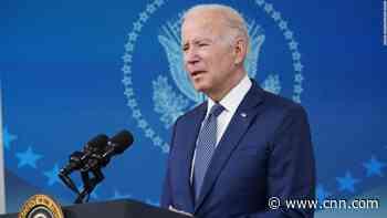 A gravelly voiced President Biden says he has a cold