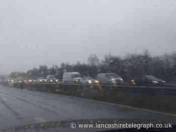 Heavy rainfall affects traffic on M65