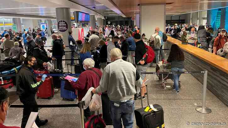 'Mass confusion' hits Calgary airport as new travel rules take hold
