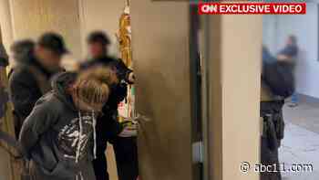 Man who helped Michigan school shooter's parents was 'friendly' with them, unaware of overnight stay