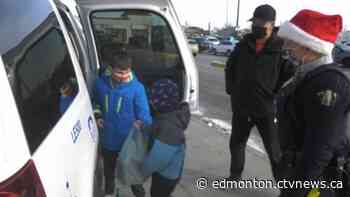 Police cruisers stuffed with food bank donations in Leduc - CTV News Edmonton