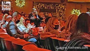 Masked Chrissy Teigen and John Legend buy out entire row at NYC's vax only Radio City Music Hall