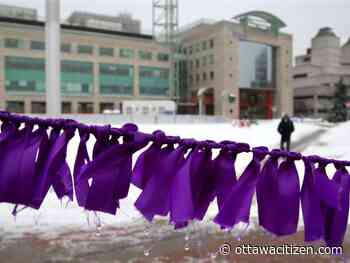 City Hall covered in purple ribbons as women's advocacy groups demand more affordable housing