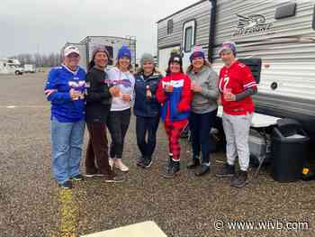 Windy, rainy weather doesn't deter Bills fans tailgate