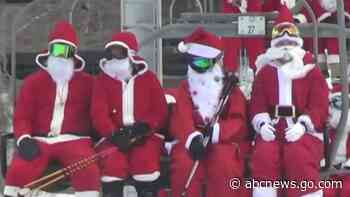 WATCH:  Skiing Santas shredding Maine slopes for charity