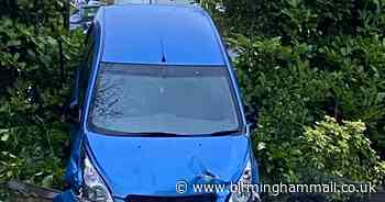 Car careers off Sutton Coldfield road through fence at ‘accident blackspot’ - Birmingham Live