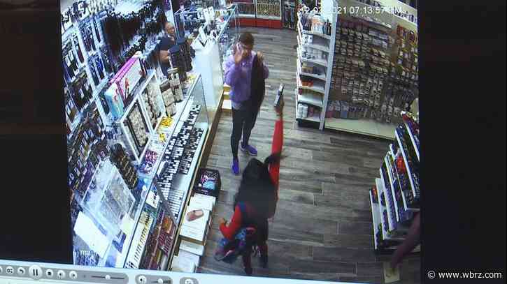 Armed robber fired gun inside beauty store after being confronted by worker