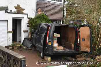 Van plunges into Bradford house and causes huge damage