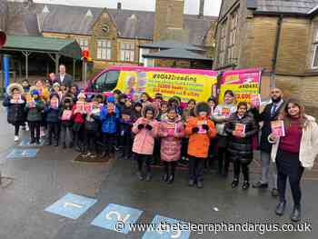 Kids given books as 'reading' road trip calls into Bradford