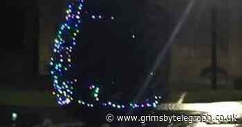 Police want to speak to these people after Grimsby Christmas tree vandalised - Grimsby Live