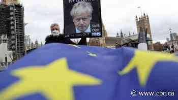 U.K. PM apologizes, aide resigns, as scandal over alleged Christmas party intensifies