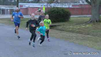 Gulfport family prepares for December tradition of Gulf Coast Marathon - WLOX