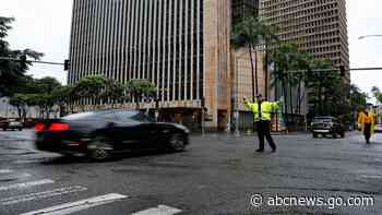 Hawaii recoups from big storm amid lingering flood threats