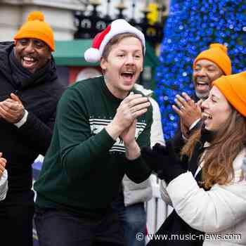 Professor Green surprises Londoners with Christmas carols