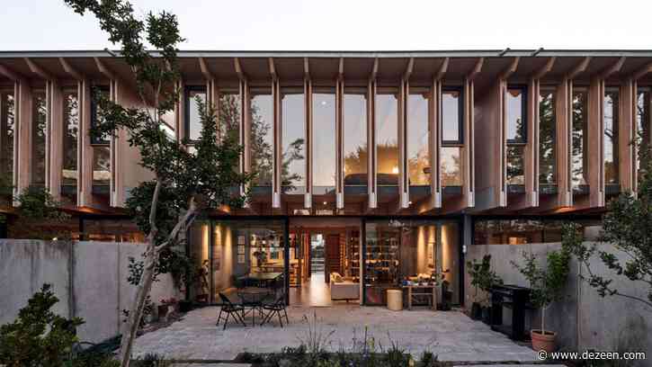 Glue-laminated timber structure forms San Crescente housing block in Santiago