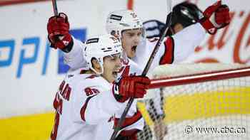 Aho scores OT winner as Hurricanes down Flames