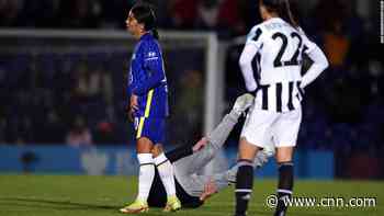 Chelsea player barges pitch invader to the ground, gets yellow card