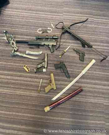 Burnley: two more arrests as officers raid homes