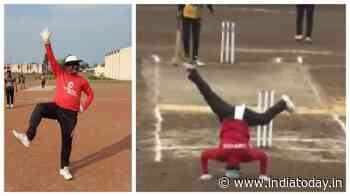 This umpire's wide signal with leg split is hilarious. Michael Vaughan reacts to viral video - India Today