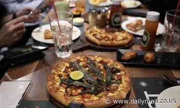 Major fast-food chain in Thailand sells pizzas topped with a cannabis leaf - Daily Mail