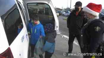 Police cruisers stuffed with food bank donations in Leduc - AM800 (iHeartRadio)