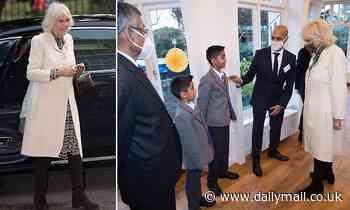 Snow queen! Duchess of Cornwall on visit to Royal Trinity Hospice in London - Daily Mail