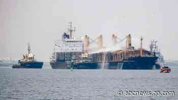 German ship with burning timber cargo towed to Swedish port
