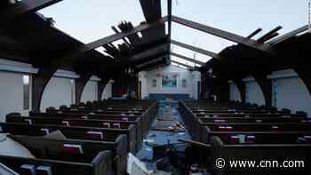 A tornado hit a candle factory with about 110 people inside
