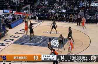 Syracuse’s Frank Anselem throws down a monster poster dunk on Ryan Mutombo