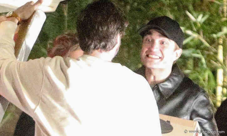 Robert Pattinson Looks Ecstatic with His Holiday Gifts During Night Out with Suki Waterhouse
