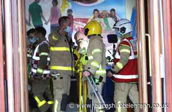 Pictures capture the drama after Blackpool Tower evacuated today after smoke seen at the base