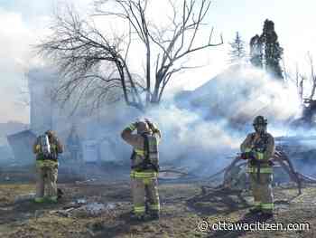 Firefighters battle blaze — and other dangers — at home on Fourth Line Road