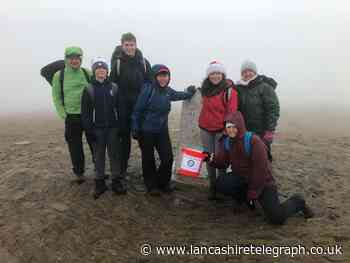 Blackburn and Darwen brass band perform carols on Pendle Hill in fundraiser