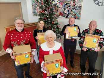 Atherton community trust delivers defibrillators to schools - The Bolton News