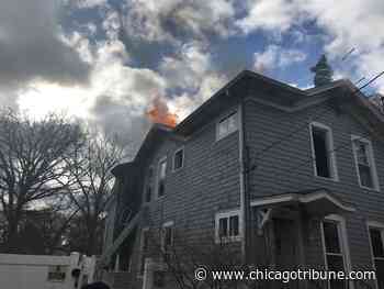 Aurora firefighter injured during fire at apartment building - Chicago Tribune