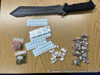 Knife and drugs discovered in speeding Bolton car