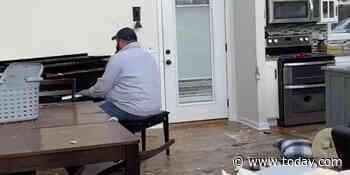 Kentucky man seen playing piano in home with roof torn off by tornado