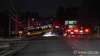 Child dies, another seriously injured in Quebec after school bus hits truck